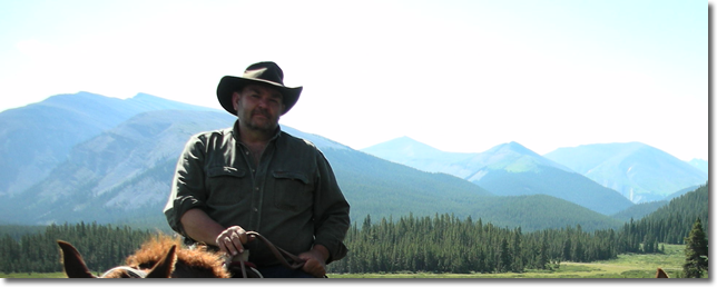 photo of Randy in the Rocky Mountains horseback riding